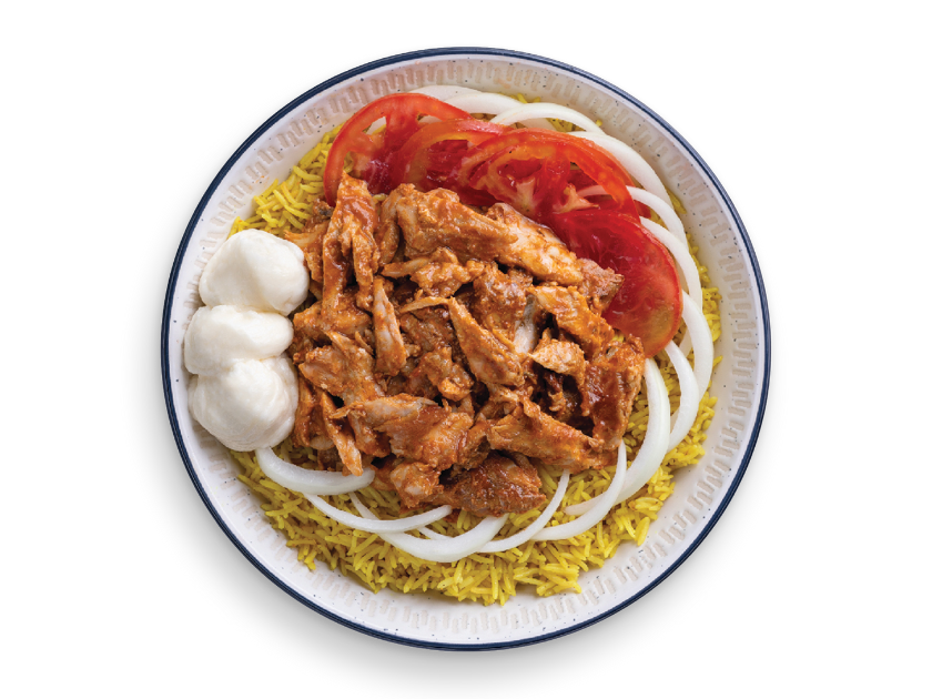 Butter chicken served over basmati rice with onions, parsley, tomatoes and garlic sauce